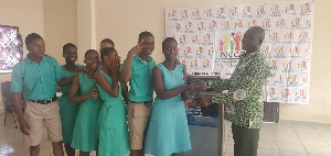 Students from the winning school receiving their award