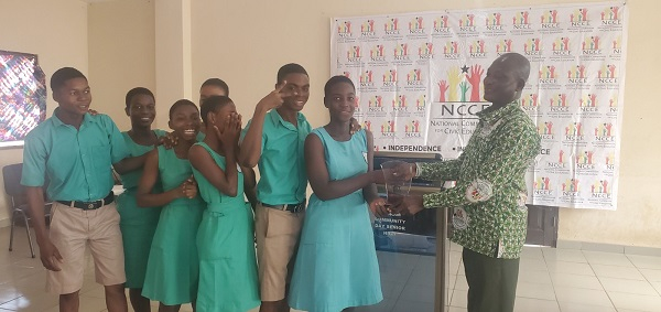 Students from the winning school receiving their award