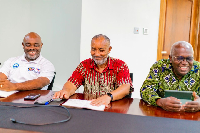 Alex Mould (middle) is the CEO of MiDA