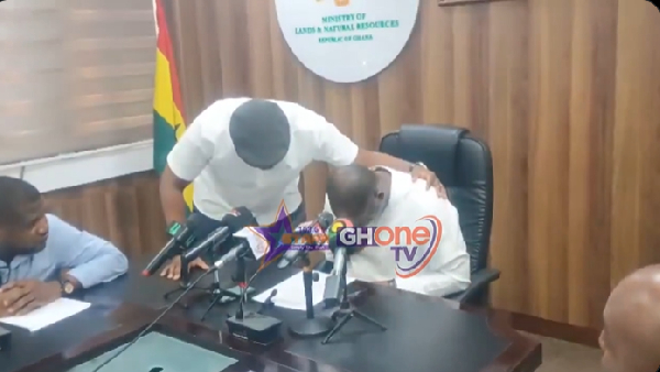 Emmanuel Armah-Kofi Buah (R), was captured shedding tears