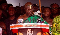 Asantehene Otumfuo Osei Tutu II behind the 'Asante King' lectern