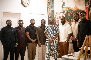 KOD (in stripped kaftan) with the members of The Compozers during their visit