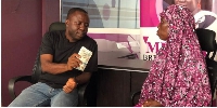 Breast cancer patient, Abiba Abu receiving a cash amount of Five Hundred Ghana cedis
