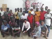 Members of the door-to-door for Mahama in a group protograph after the launch