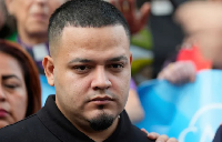 Kilmar Abrego Garcia joins supporters in a protest rally outside the Immigration and Customs office