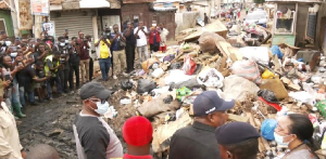 Director-General of GHS during disinfection exercise at Tema Station Market