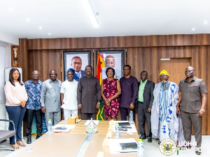 John Jinapor pictured with new board members of GRIDCo