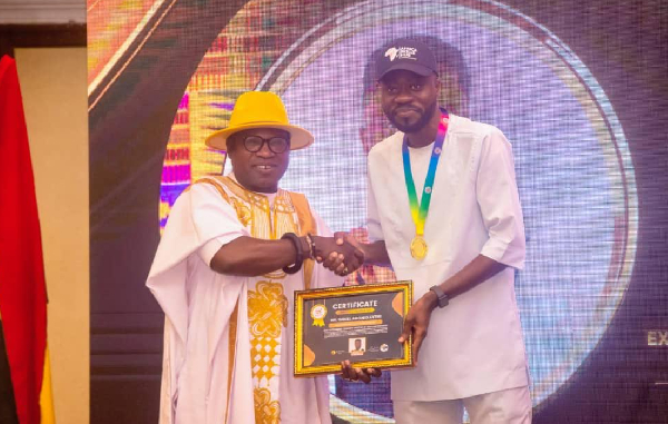 Daniel Amoako Antwi, [R]  Executive Director of Africa Skills Hub Foundation. receiving an award