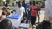 A man is seen casting his vote