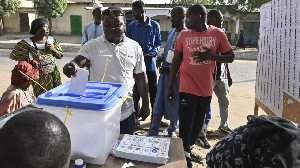 A man is seen casting his vote