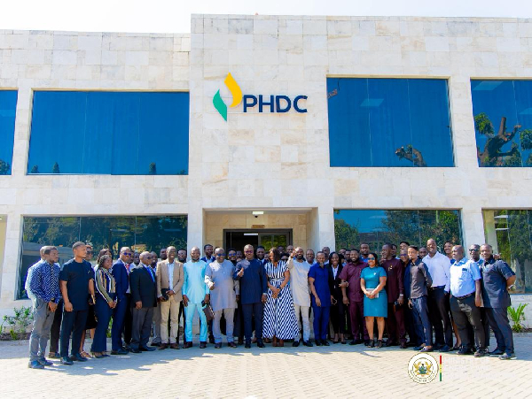 Energy minister, Dr John Abdulai Jinapor in a photo with management and staff of PHDC