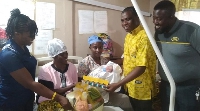 Gifts being presented to a baby