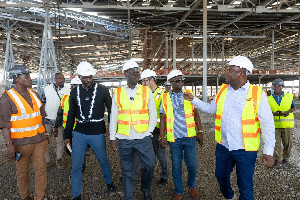Ato Forson (M) with an entourage at the site