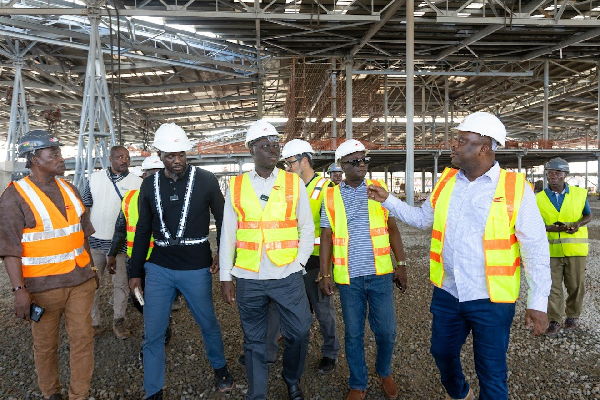 Ato Forson (M) with an entourage at the site