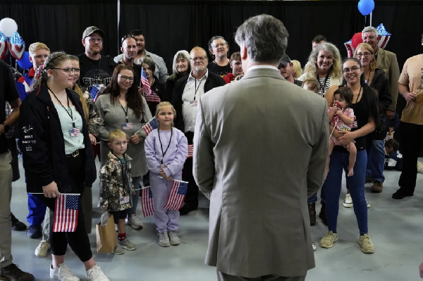 US Deputy Secretary of State Christopher Landau greets Afrikaner refugees from South Africa, on Mond
