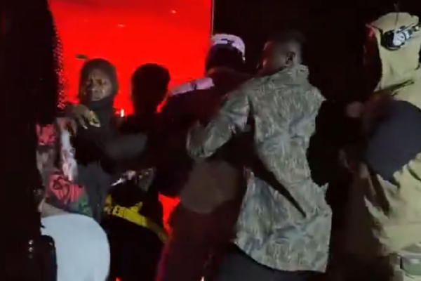 The fan clung to Blacko so closely that even security personnel struggled to free the artiste