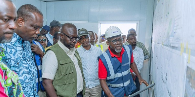 Asenso-Boakye with others to inspect the project