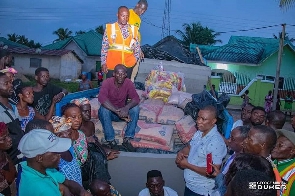 George Mireku Duker donated items to flood victims