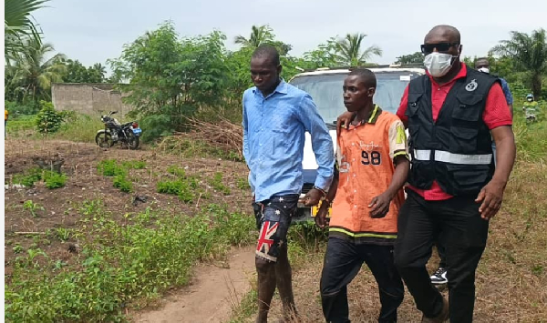 Police walks with suspects