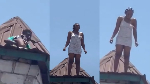 Watch as Nigerian woman is rescued after attempting to jump from roof in Ghana