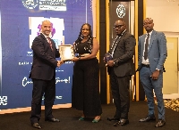 Hajia Abibata Shanni Mahama Zakariah receiving her award