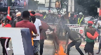 The protestors setting NPP flags and banners on fire