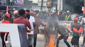 The protestors setting NPP flags and banners on fire