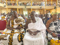 Barimah Osei Hwedie II seated in the middle in white during his 10th anniversary celebration