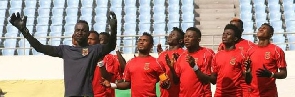 Nzema Kotoko players celebrate after winning the close encounter
