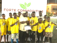 Great James Foundation players were awarded a trophy after winning the orphanage games