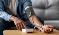 File photo of a person checking his blood pressure