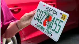 Elderly woman reacts to risqué license plate