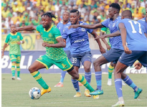 Fiston Mayele (left) vies for the ball with an Al Hilal Omdurman player during CAF Champions League