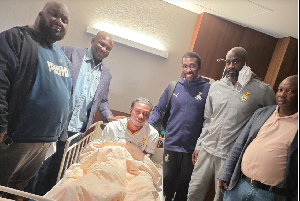 Officials from the GFA visit injured Francis Abu after successful surgery