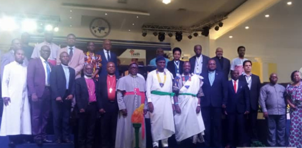 Youth and Sports Minister (Middle) together with members of the clergy at the youth conference