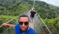 David Oscar Dogbe walks on Geierlay suspension bridge in Mörsdorf, Germany