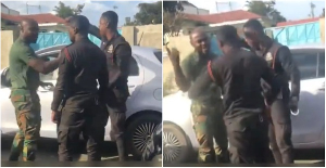 Two police officers have engaged in a heated argument with a soldier