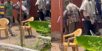 Residents are seen carrying the dead body of the girl away
