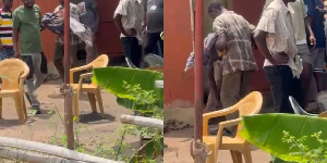 Residents are seen carrying the dead body of the girl away