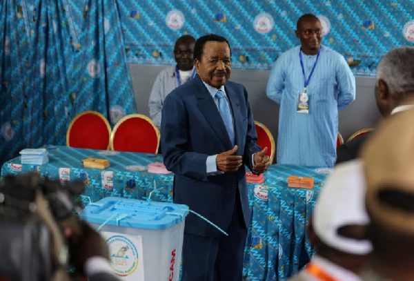 Cameroonian President Paul Biya, 92, reacts after voting in the presidential election in Yaoundé