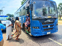 Some commuters boarding the bus