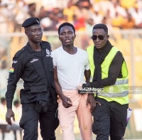The pitch invader was apprehended by the police
