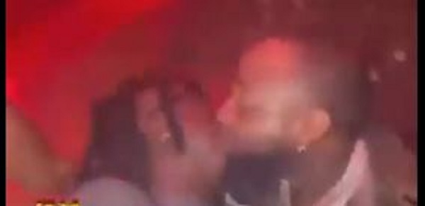 Davido kissing Stonebwoy