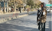 Some Taliban soldier for street
