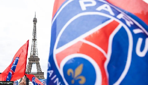 Paris St-Germain fans celebrated winning the Champions League near the Eiffel Tower in May 2026