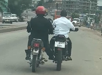 The 2 police officers in Kumasi ride indiscriminately on official bikes