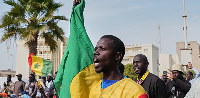 A protestor chants anti-gay slogans during a demonstration against homosexuality in Dakar