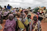 Sudanese women, who fled the conflict in Murnei in Sudan's Darfur region