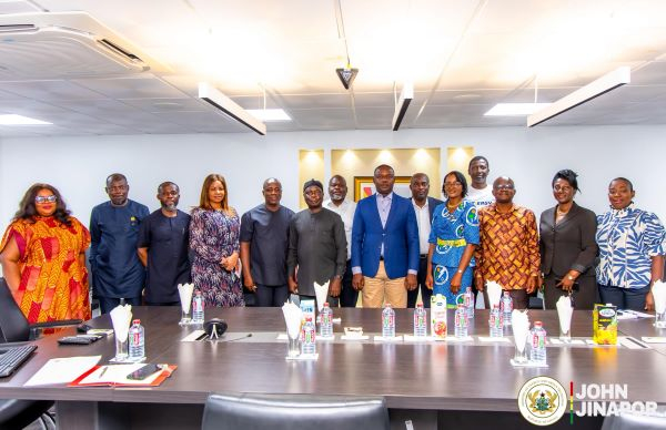 Energy minister, John Jinapor pictured with staff of Energy Commission