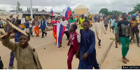 Nigerians protesting with Russian flag